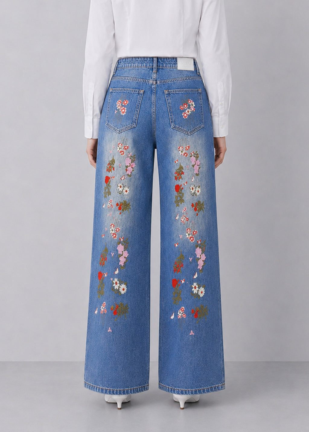 MAN Light-Wash Floral Embroidered Wide-Leg Jeans
