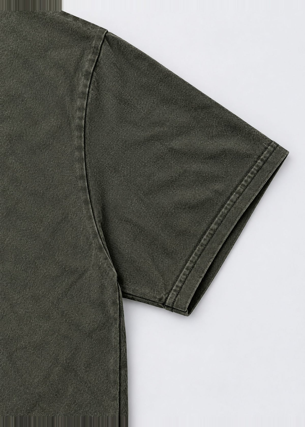 Dark Green Fantasy Graphic Tee – sleeve stitching close-up