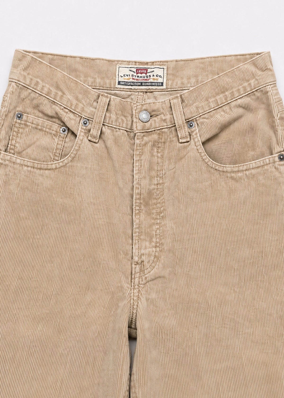 Levi's beige corduroy jeans waistband and five-pocket detail
