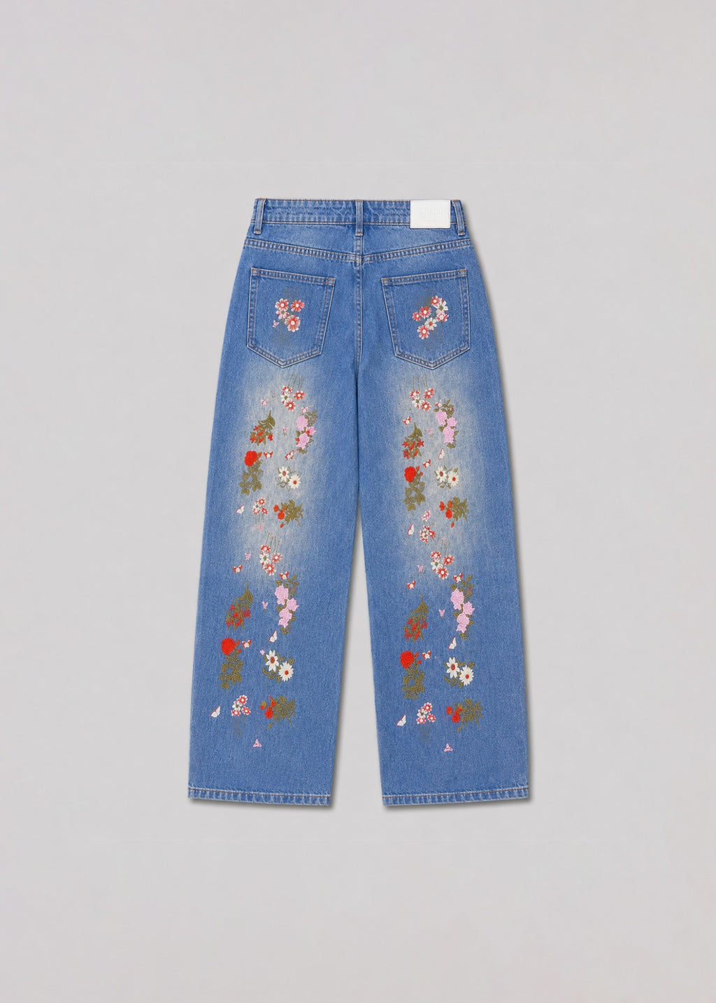 MAN light-wash floral embroidered wide-leg jeans back view