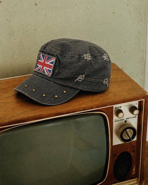 Charcoal Acid-Wash Union Jack Studded Cap, styled angle