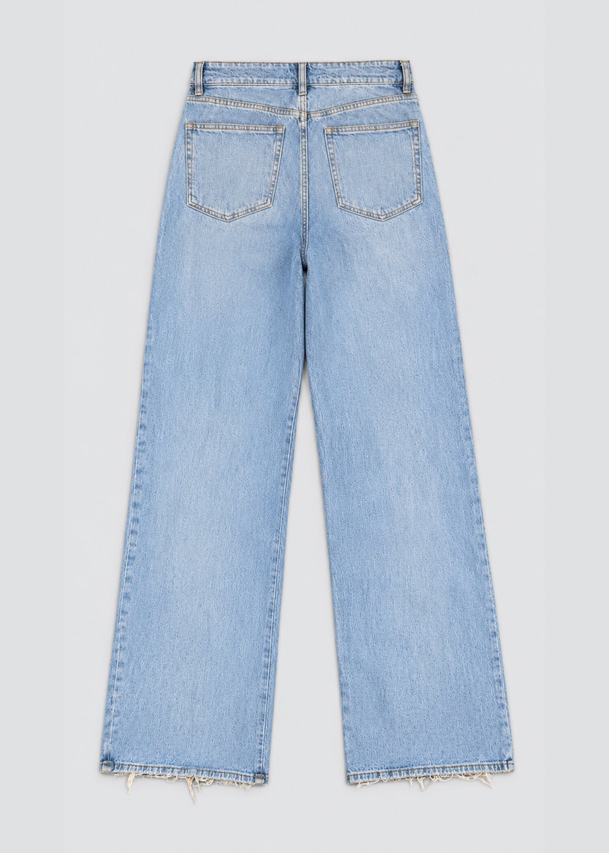 Light wash wide leg raw hem jeans back flat lay showing patch pockets