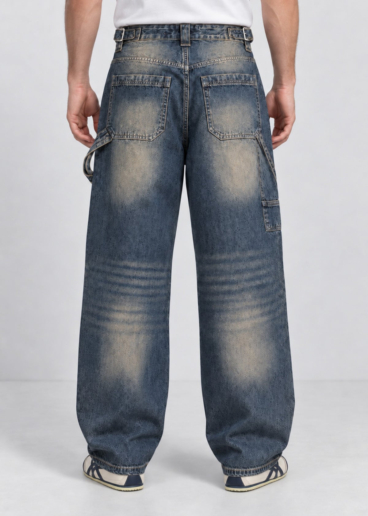 Unisex balloon fit utility jeans worn by male model, back view