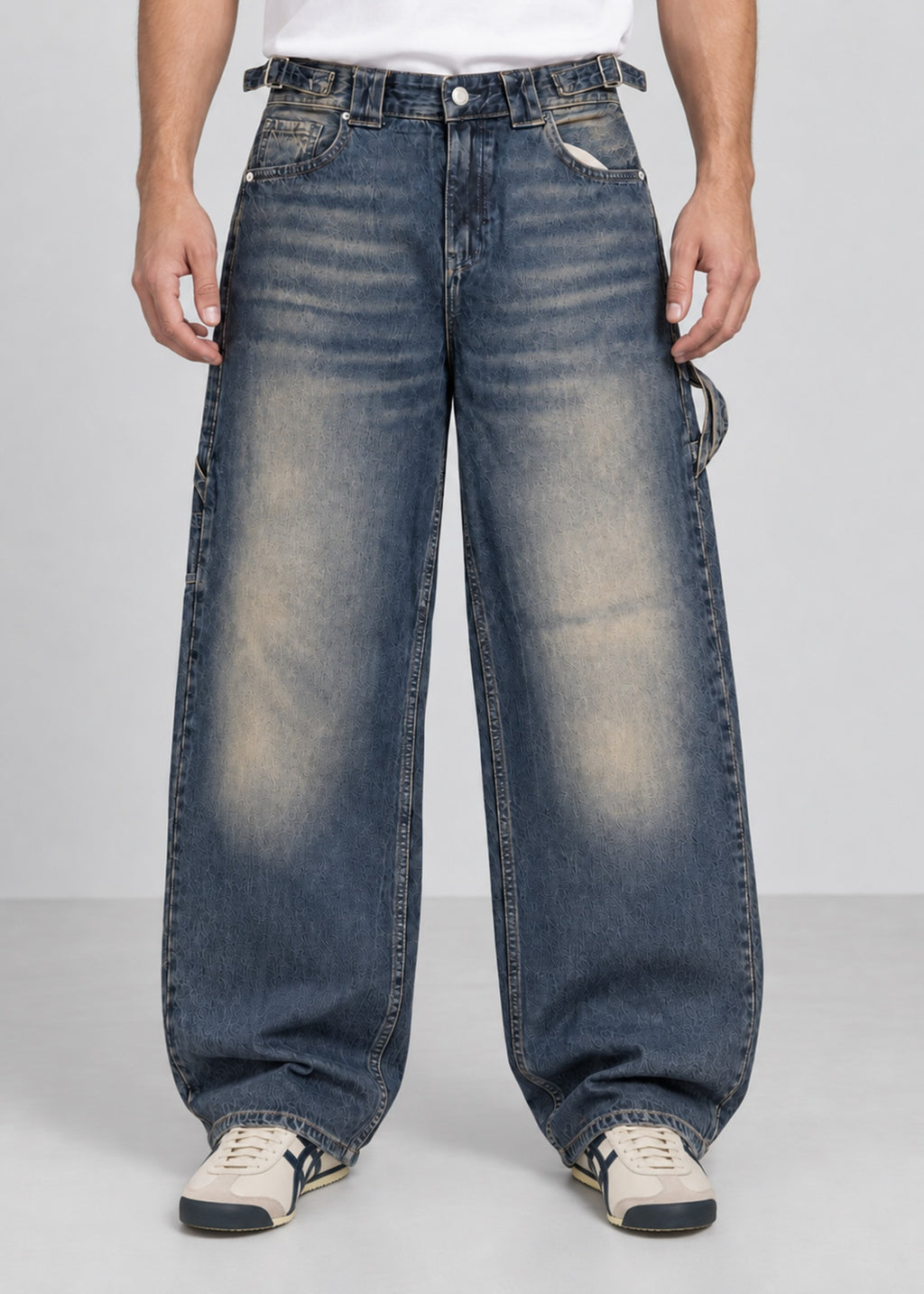 Unisex balloon fit utility jeans worn by male model, front view