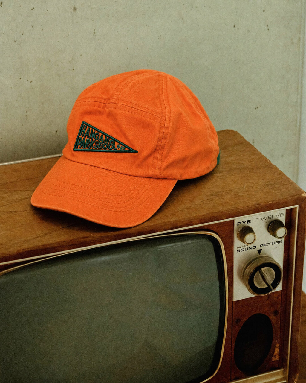 Orange Pennant Embroidered Cap, styled angle