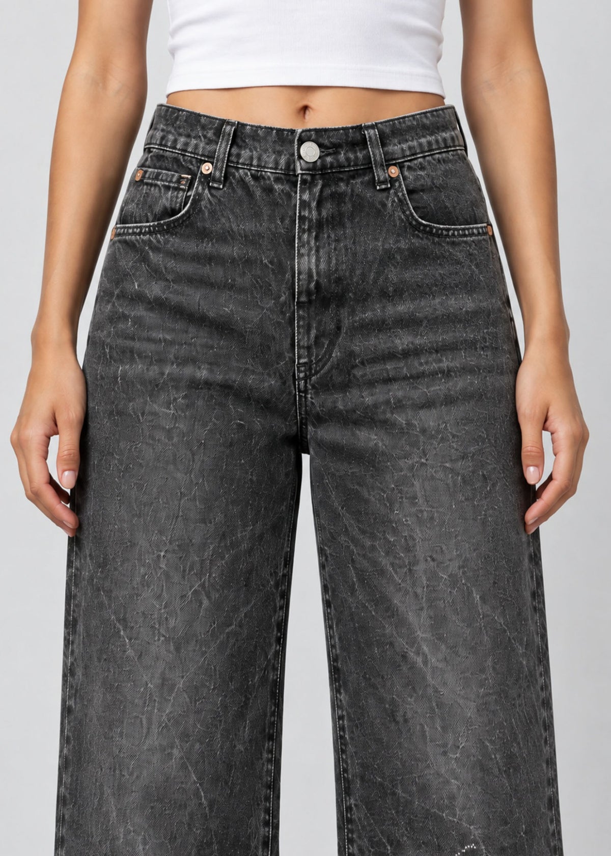 Zara charcoal acid wash wide leg jeans on female model, front waist and pocket close up