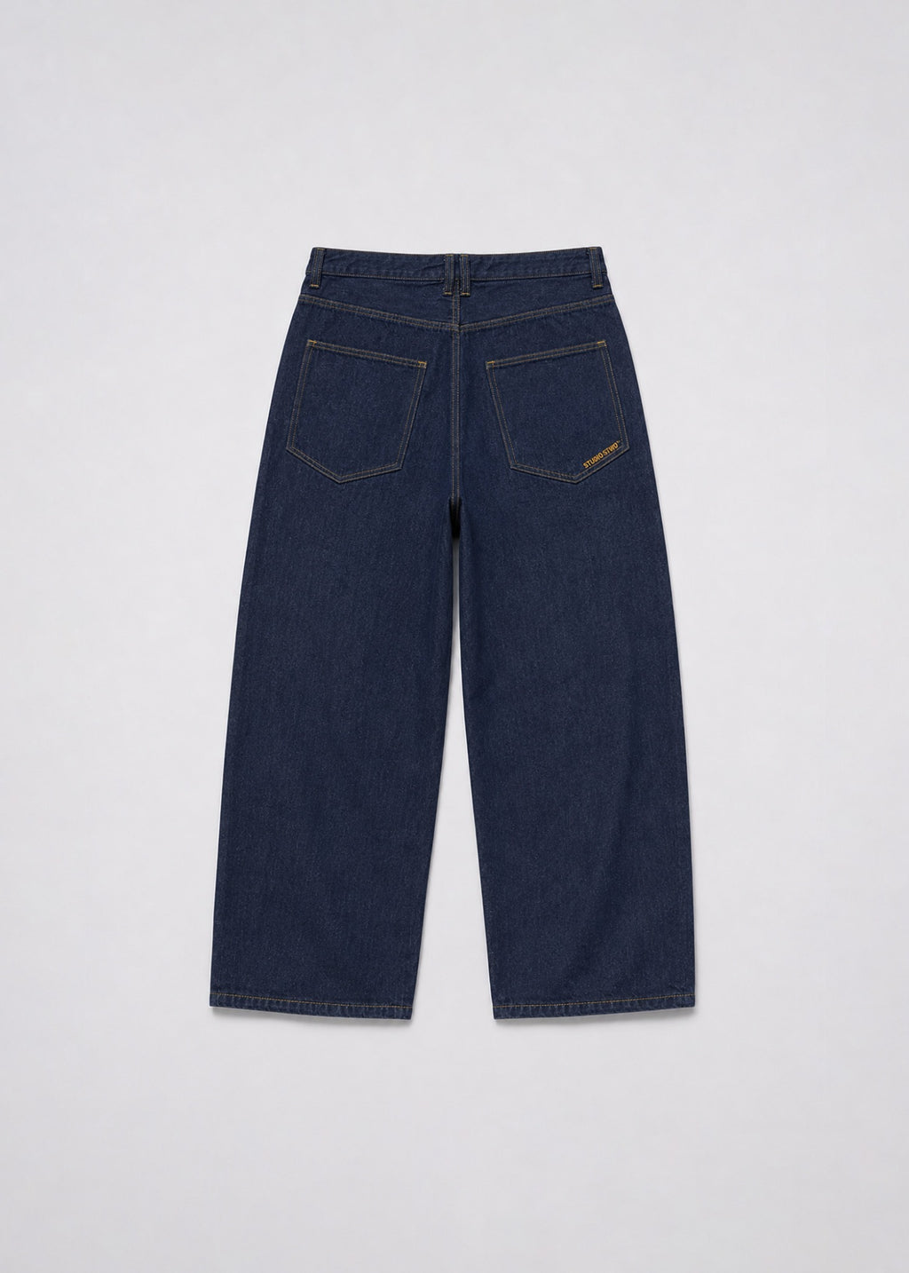Studio Stwo dark-indigo wide-leg jeans back view with branded patch pockets