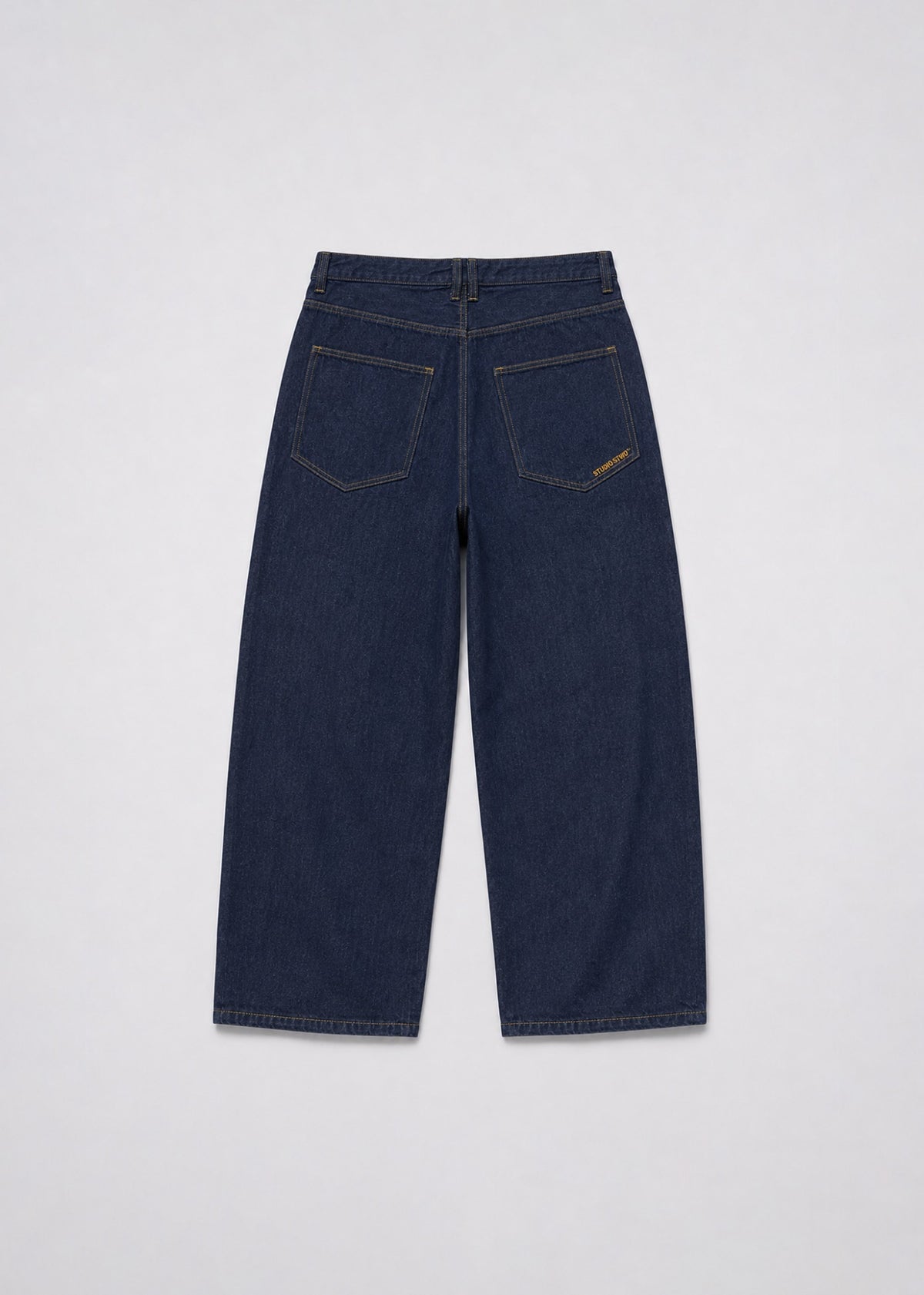 Studio Stwo dark-indigo wide-leg jeans back view with branded patch pockets