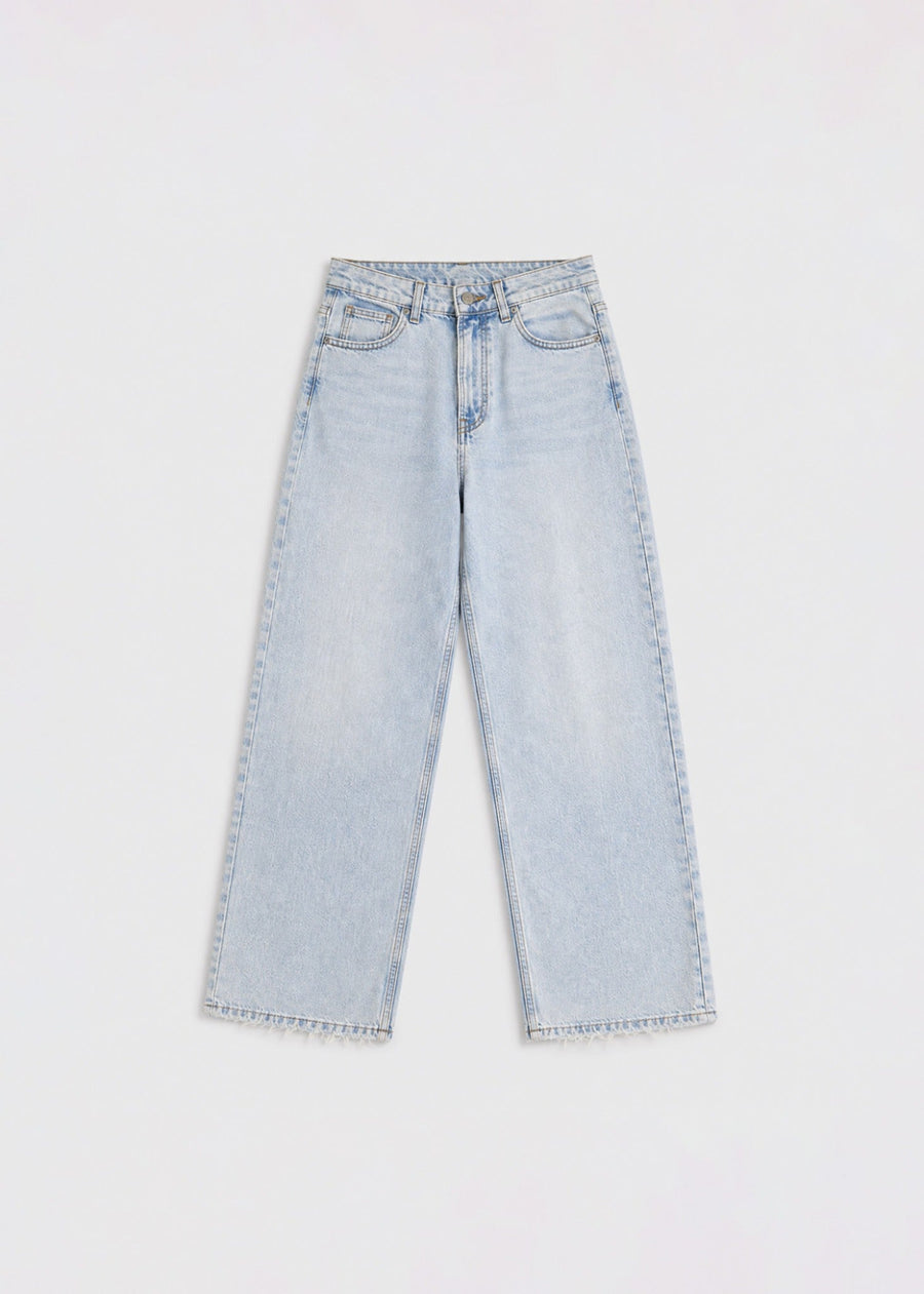 Ultra-light-wash wide-leg jeans front view with raw frayed hem
