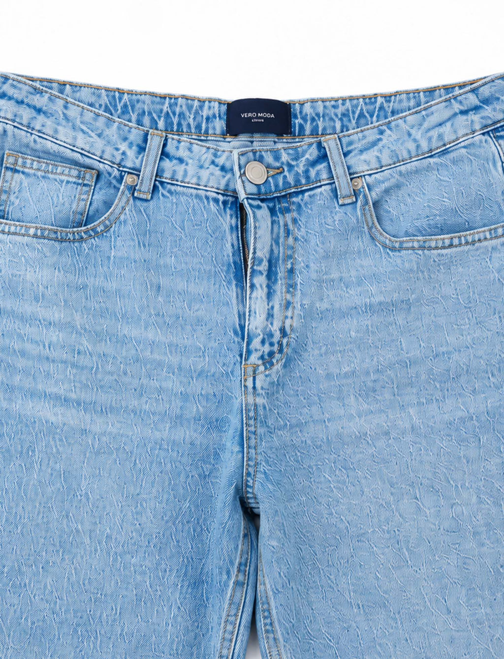 Vero Moda light-wash jeans waistband pocket and button detail