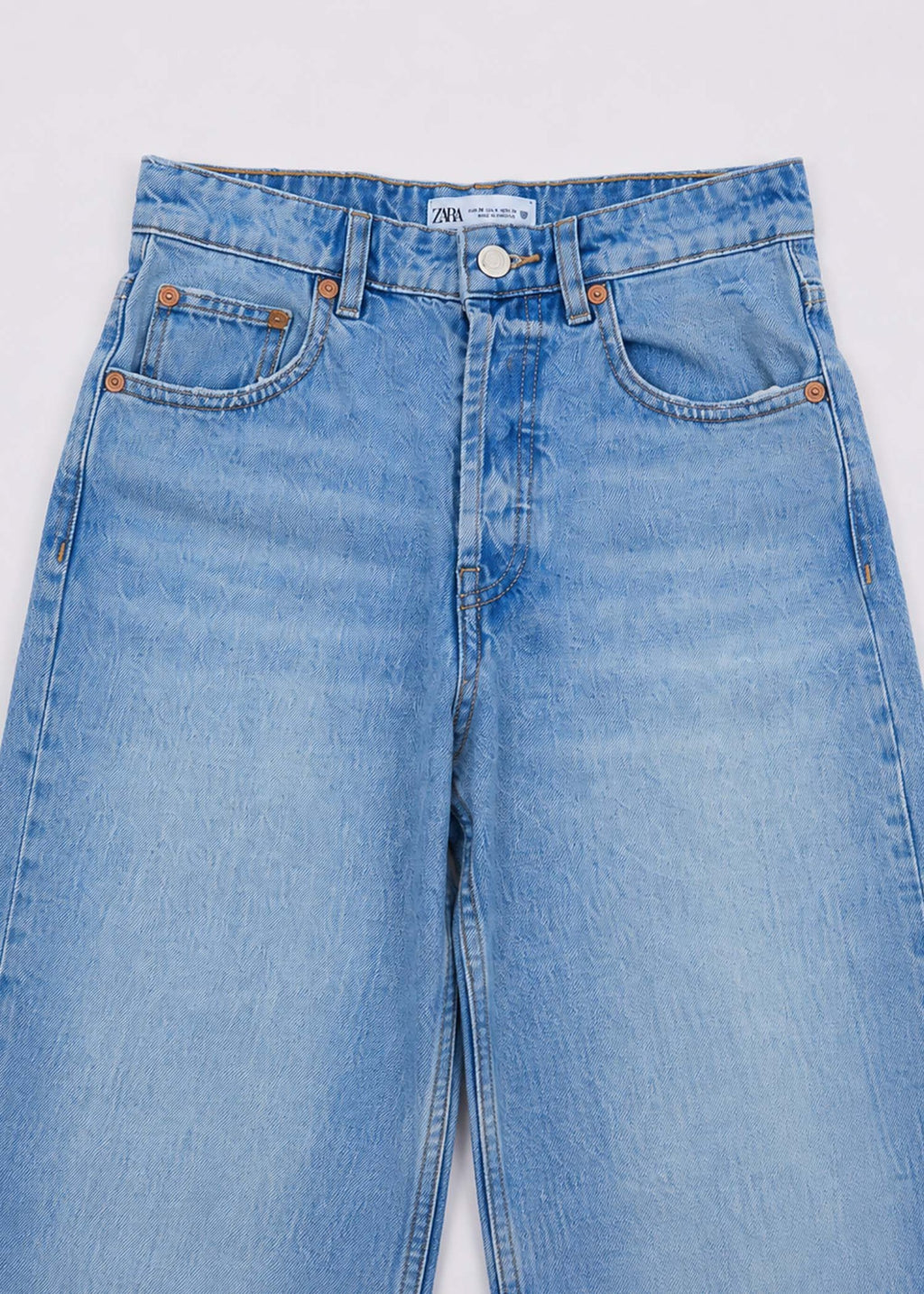 Zara light-wash jeans waistband five-pocket and button detail