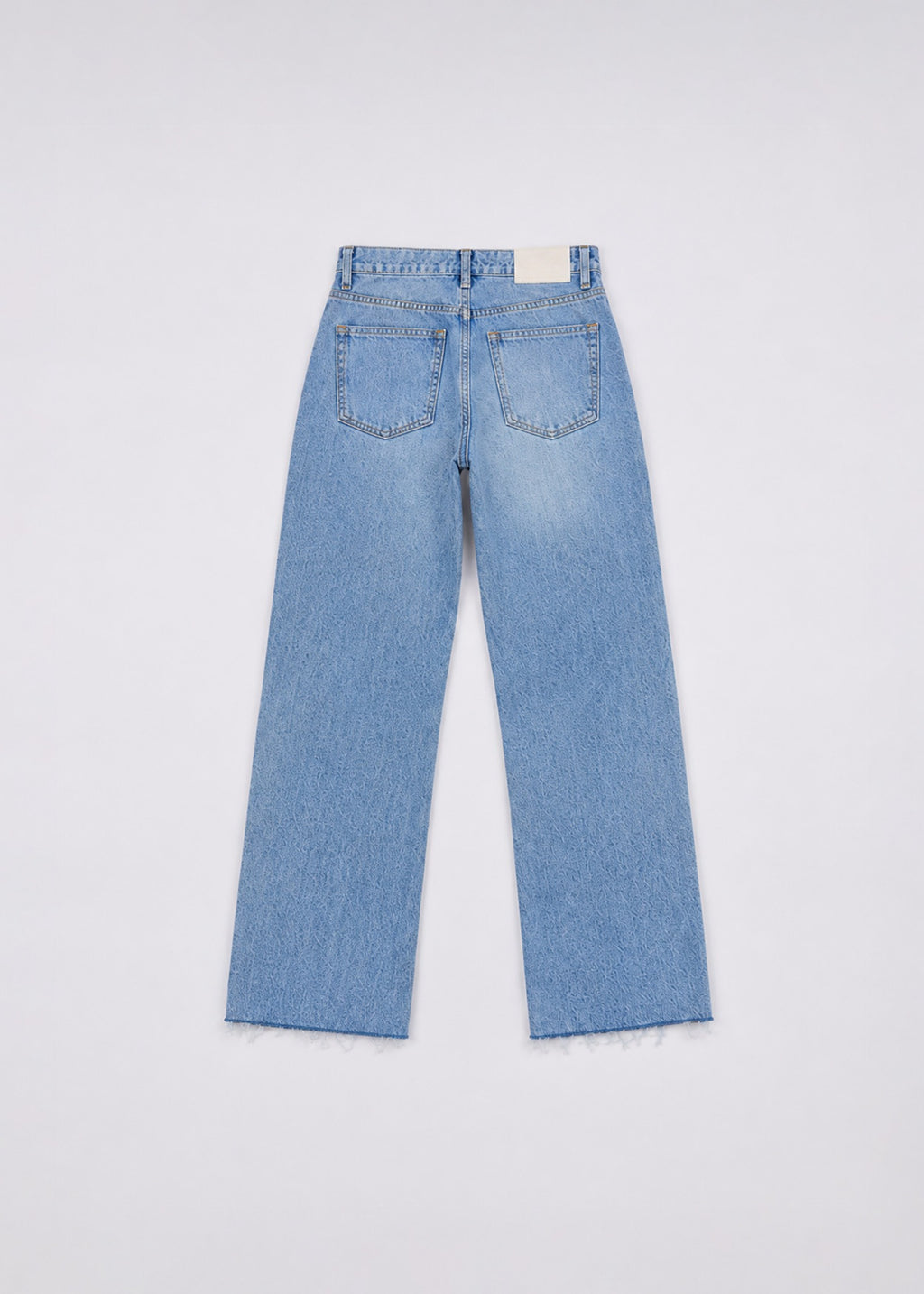 Zara light-wash wide-leg jeans back view with patch pockets