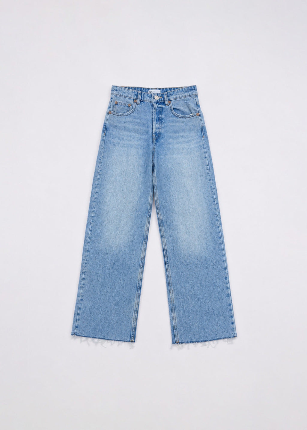 Zara light-wash wide-leg jeans front view with raw frayed hem